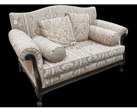 Mahogany framed Chippendale style two seater settee on ball and claw legs.