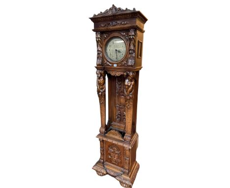 Continental carved triple weight longcase clock, 203cm.