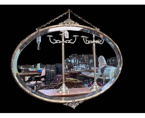 Good 1920's electro-plated framed oval bevelled wall mirror, 61cm by 78cm.