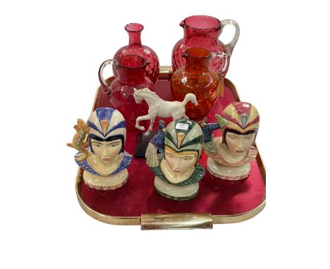 Three Kevin Francis 'Queens of the Nile' character jugs, Beswick horse and four pieces of ruby glass.