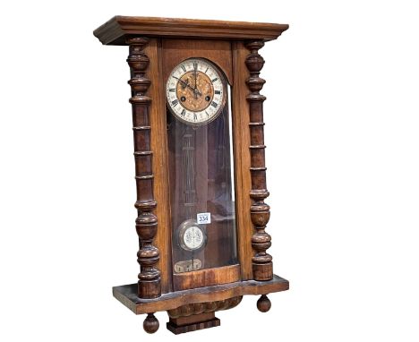 Victorian walnut Vienna style pendulum wall clock, 90cm.