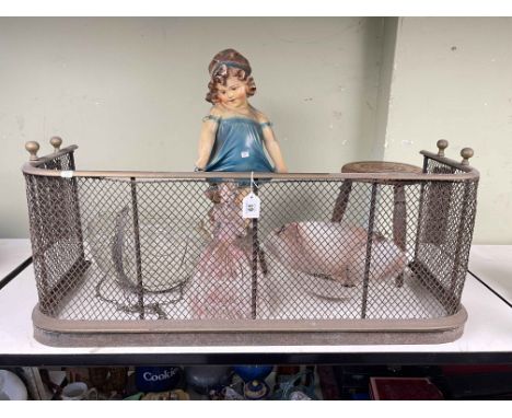 Brass fender, small three legged stool, two glass light globes and plaster figures.