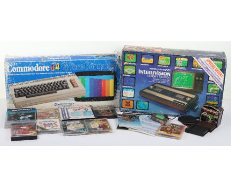 Commodore 64 boxed with games, C64 comes in original box with packing and power cable, box is in fair condition has tears, un