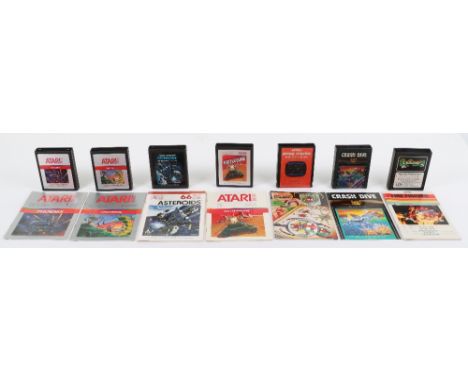 Retro Atari 2600 Cartridge games with manuals, including, Phoenix, spider fighter, crash dive, asteroids, centipede and Battl