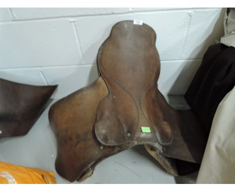 A vintage leather horse riding saddle with English design