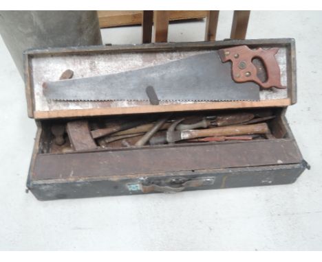 A vintage tool box and carpentry tools