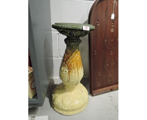 A vintage ceramic jardiniere stand
