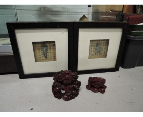 Two vintage Jin Chan or lucky money toad figures and similar framed items