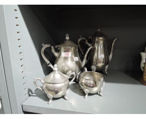 A vintage tea set with Regency style design work