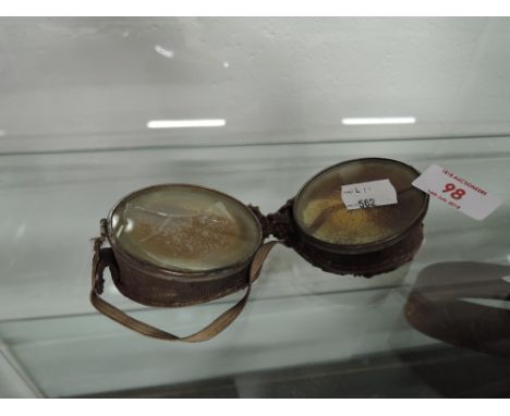 A pair of vintage aviator or tank driver style goggles af