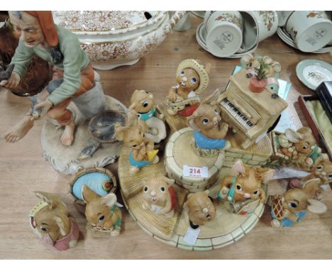 A selection of vintage Pendelfin figures and figurines including piano player and stand