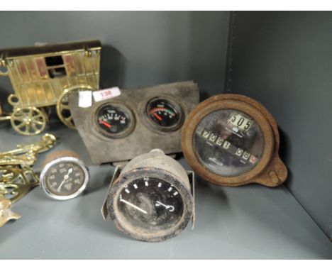 A selection of vintage motor car and dashboard guages including Stewart and Smiths