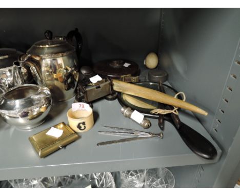 A selection of vintage curios and trinkets including whistle