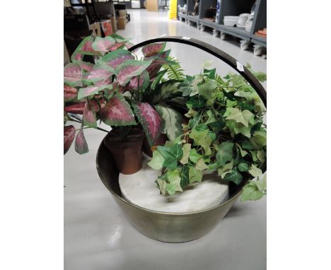 A modern decorative  false house plant and planter
