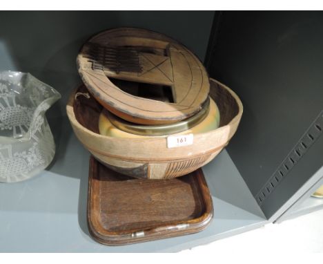 A selection of vintage turned and carved wood bowls