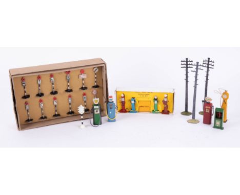 Dinky set No. 47? road signs, petrol pumps, telegraph poles and boxed Dinky 49 Petrol Pumps and Oil Bin.