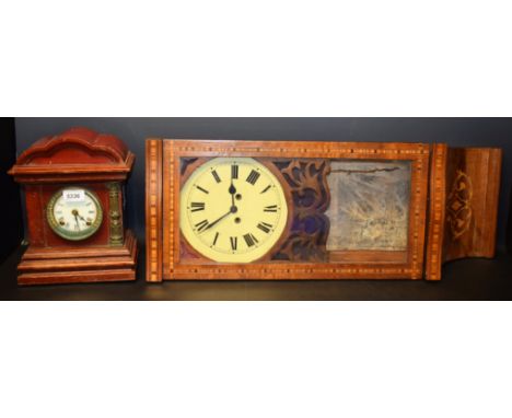 An American marquetry inlaid mahogany wall clock, the face with Roman numerals, twin winding holes; a French style mantel clo