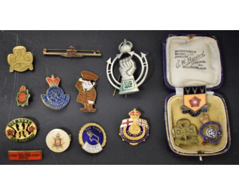 A Royal Artillery enamel badge; Guides badges; an RAC badge; other enamel badges; a Junior Imperial and Constitutional league