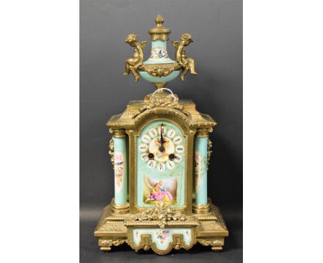 A large 19th century French mantel clock, porcelain panels