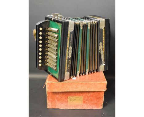 A Varsity B &amp; H London accordion, ten buttons, cased