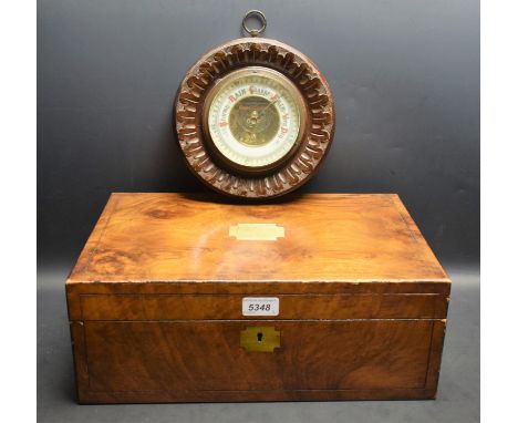 A 19th century walnut veneered jewellery casket, fitted interior; a mahogany circular aneroid barometer (2)