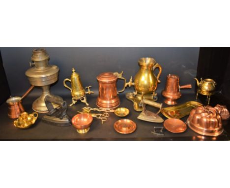 Metalware - a Middle Eastern copper coffee pot; a brass spirit warmer; a pewter oil lamp with glass chimney; Victorian and la