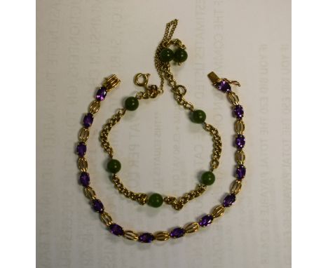 ***Please note amended description***An amethyst fancy link 9ct gold bracelet, stamped 375, 5.2g gross; 9ct gold and green st