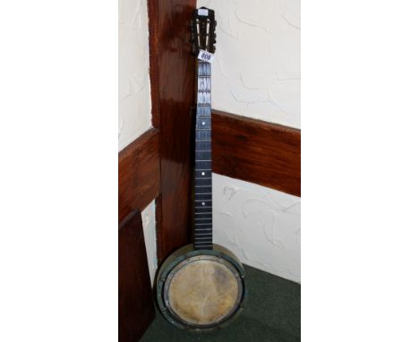 Vintage banjo, lacking strings 