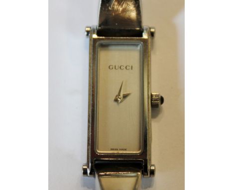 Ladies Gucci white metal bangle wristwatch, No 0804169