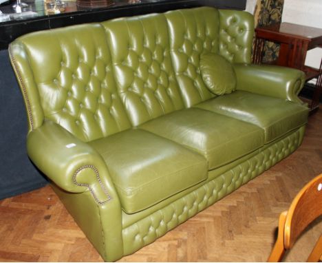 Chesterfield green button back three piece suite comprising of  two armchairs and a sofa