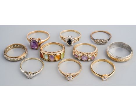 A group of 9ct yellow gold and gem-set rings, including amethyst and pearl, size O1/2; amethyst, size U; multi-gem ring, size