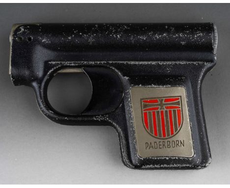 A vintage Paderborn cigarette lighter in the form of a small pistol, length 9cm