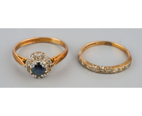 18ct gold cluster ring ( 3.1g) and 9ct gold half eternity ring (0.9g)