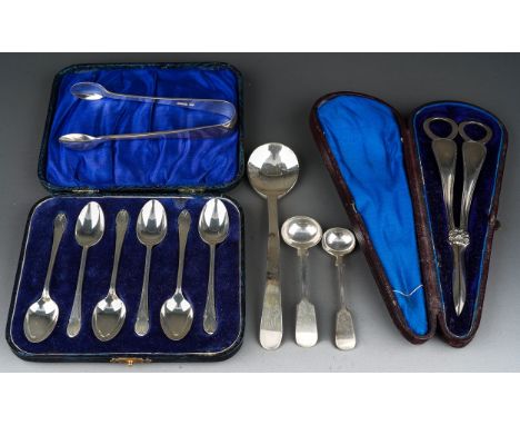 A collection of silver to include: Arts &amp; Crafts style plain silver spoon, stamped SILVER; a cased set of six coffee spoo