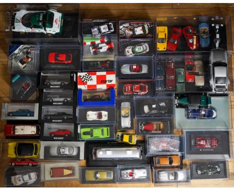 A boxed Exclusiv Car 1:18 Lancia Rally car together with a large collection of mainly die cast mainly 1:43 model cars, most b