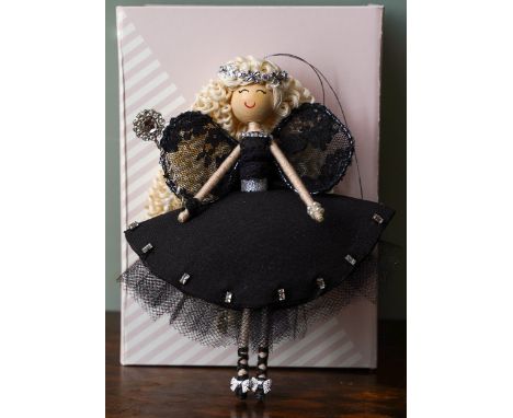 A Fairy made from the fabric from Lorraine Stanley’s bra &amp; additional materials. Approx size H 17 cm x W 13cm All the pro