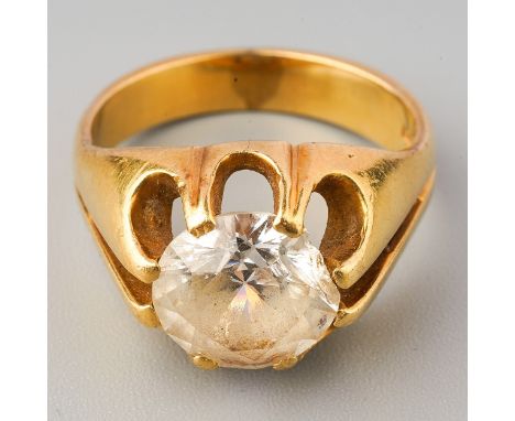A gem set single stone ring, set with a circular-shape mixed cut rock crystal, within an extended eight-claw setting, to the 