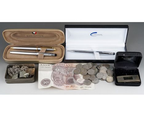 Three pens, money clip, whistle, chains, coins £10 note