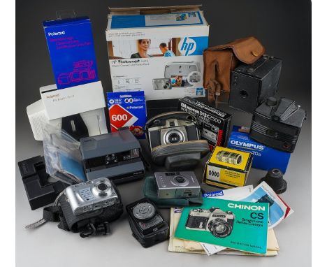 A collection of film and digital camera equipment including Polaroid Spectra 2, 600 polaroid film and accessories, Kodak Brow