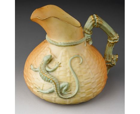 An early 20th Century Royal Worcester blush ivory porcelain basket weave and lizard jug, with relief green and gilt-heightene