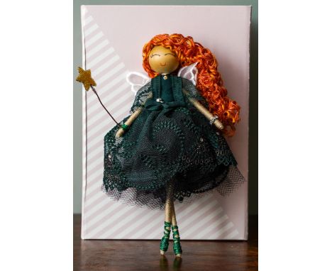 A Fairy made from the fabric from Irita Marriott’s bra &amp; additional materials. Approx size H 17 cm x W 13cm All the proce