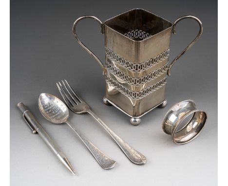 A George V silver two handled cruet bottle holder on ball feet with pierced sides, hallmarked by S J Levi &amp; Co., Birmingh