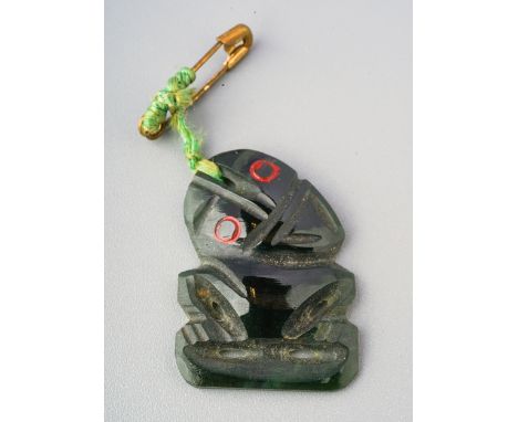 A New Zealand Maori Hei-tiki carved jade pendant, 3cm high