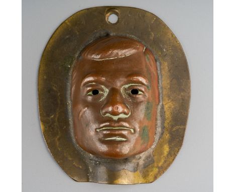 A metal Action Man front of face head mould, height 6.2cm, the mould has been consigned by the person who found it came at a 