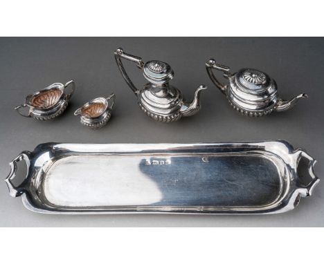 An Elizabeth II silver miniature four piece Georgian style tea and coffee service on twin handled tray, makers C S R Ltd, Lon