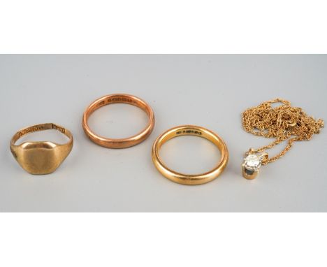 Two 9 ct gold wedding bands, further 9 ct gold ring and a 9 ct gold chain. Gross weight 7.1g