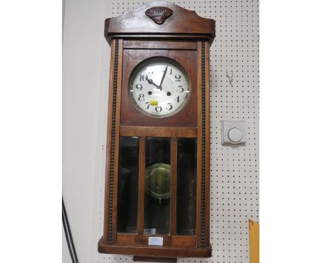A VINTAGE WALL CLOCK&nbsp;