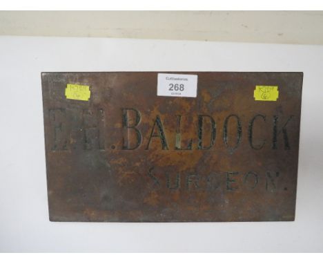 A VINTAGE BRASS PLAQUE 'E.H. BALDOCK, SURGEON' 