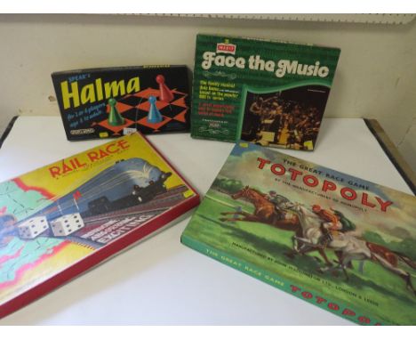 FOUR VINTAGE BOXED GAMES TOTOPOLY, RAILRACE, FACE THE MUSIC AND HALMA