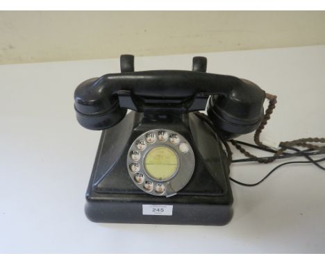 A VINTAGE TELEPHONE WITH MODERN CABLE TELEPHONE ADAPTER (UNCHECKED)